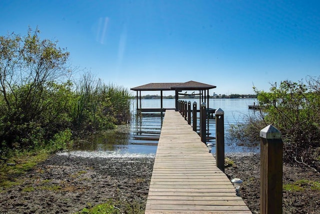 view of dock with a water view