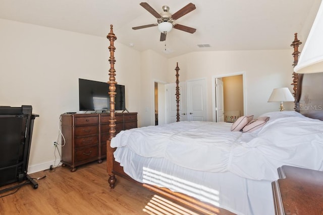 bedroom with light wood-type flooring, ceiling fan, and lofted ceiling