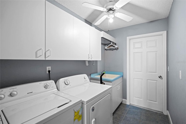 washroom featuring cabinets, a textured ceiling, ceiling fan, sink, and separate washer and dryer