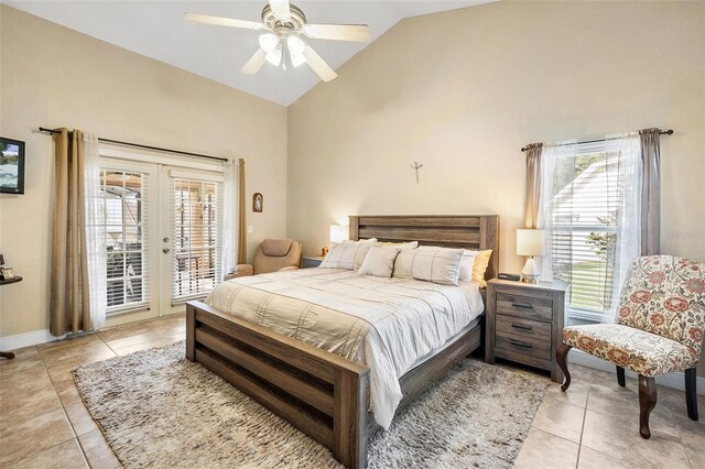 tiled bedroom featuring access to outside, high vaulted ceiling, french doors, and ceiling fan