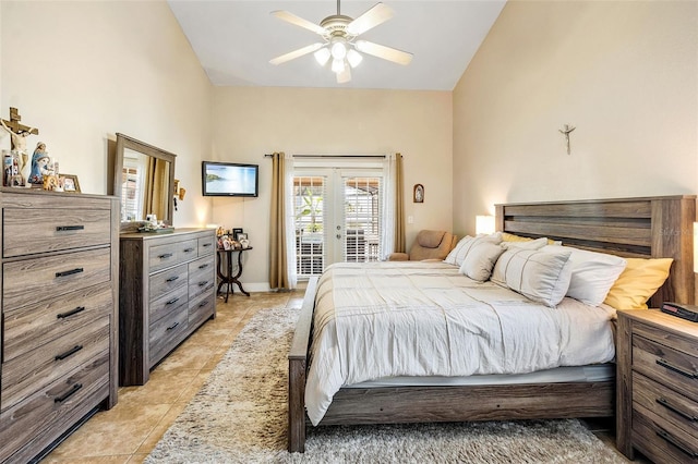 tiled bedroom featuring access to outside, high vaulted ceiling, french doors, and ceiling fan