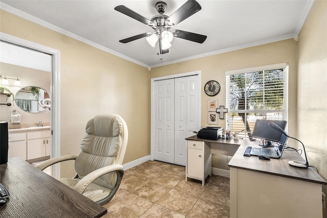 tiled office space featuring ceiling fan, ornamental molding, and sink