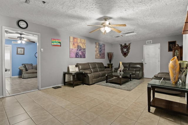 tiled living room with a textured ceiling