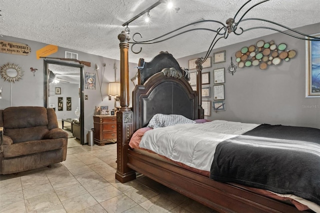 bedroom with a textured ceiling