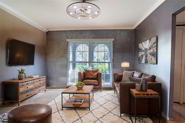 living room featuring light hardwood / wood-style flooring and crown molding