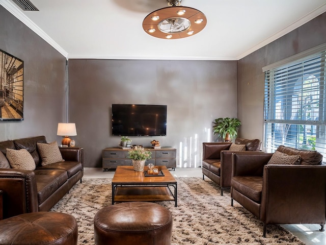 living room featuring crown molding