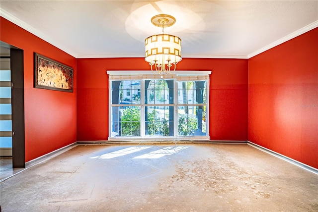 spare room with ornamental molding and a chandelier