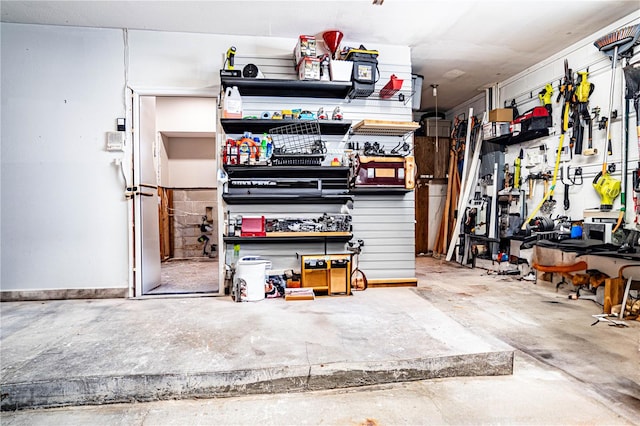 garage with a workshop area