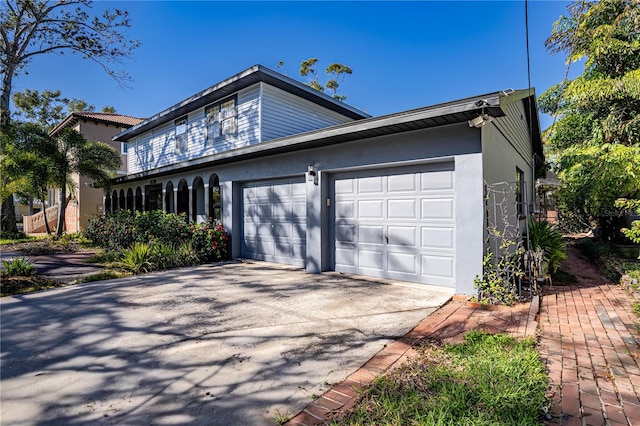 view of property exterior featuring a garage