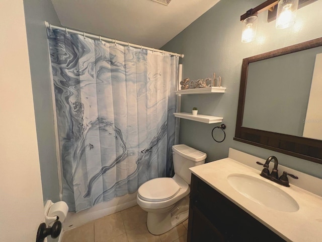 full bathroom with tile patterned flooring, vanity, toilet, and shower / bath combo