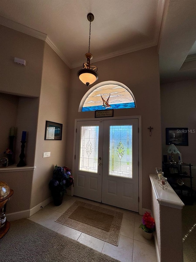 tiled entryway with ornamental molding