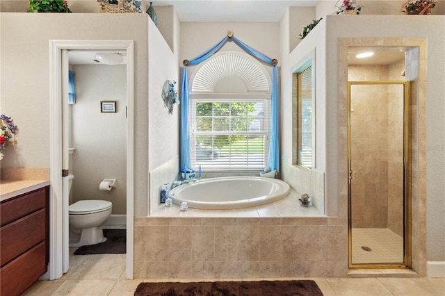 full bathroom featuring vanity, tile patterned floors, plus walk in shower, and toilet