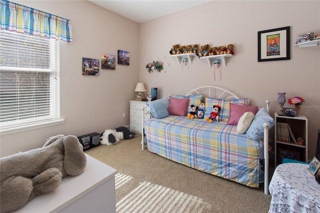 bedroom featuring carpet