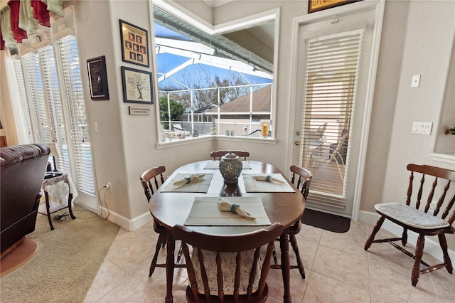 dining area with light tile patterned floors