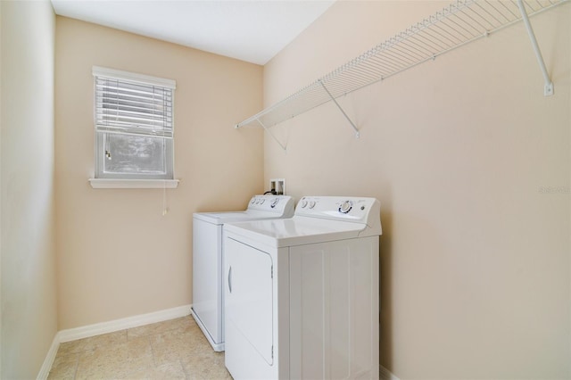 laundry room with washer and dryer