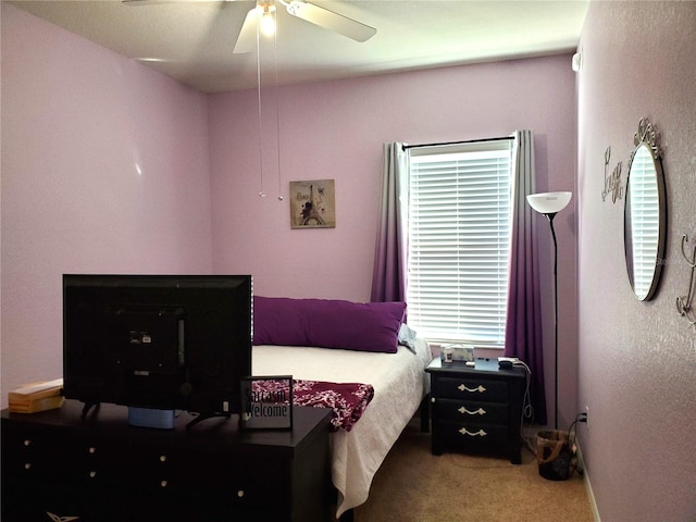 bedroom with carpet flooring and ceiling fan