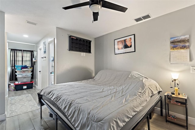 bedroom featuring ceiling fan and light wood-type flooring