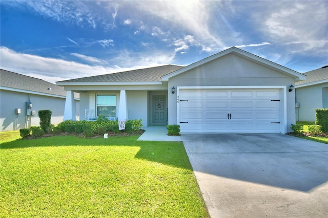 ranch-style home featuring a front lawn and a garage