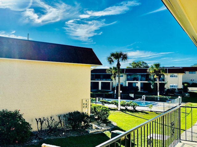 exterior space featuring a balcony