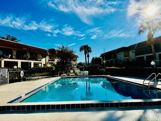 view of swimming pool featuring a patio