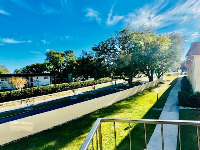 view of community featuring a lawn