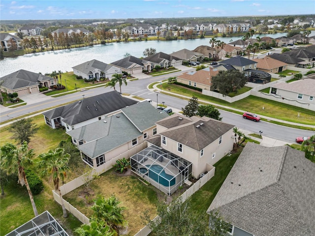 drone / aerial view with a water view