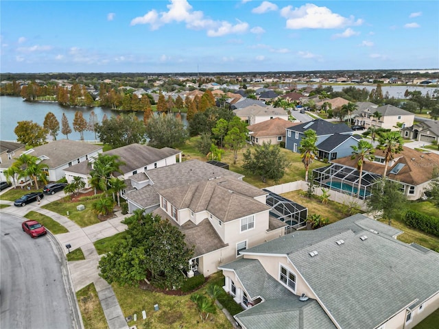 drone / aerial view with a water view