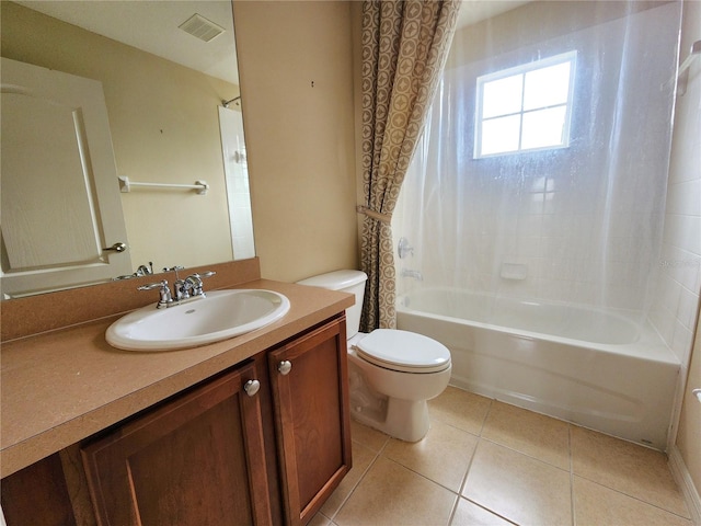 full bathroom featuring vanity, tub / shower combination, tile patterned floors, and toilet