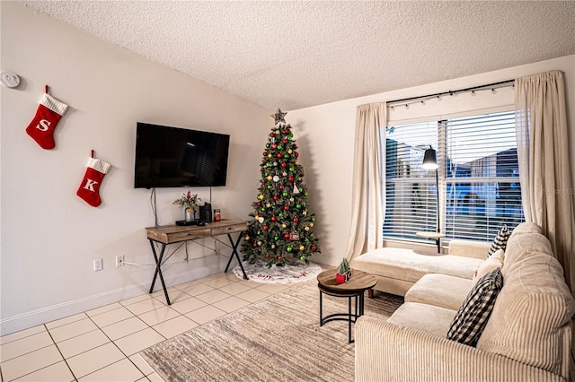 tiled living room featuring lofted ceiling and a textured ceiling