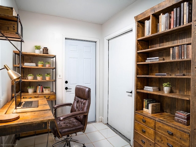 office space with light tile patterned flooring