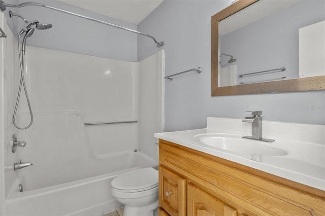 full bathroom featuring shower / bathing tub combination, vanity, and toilet