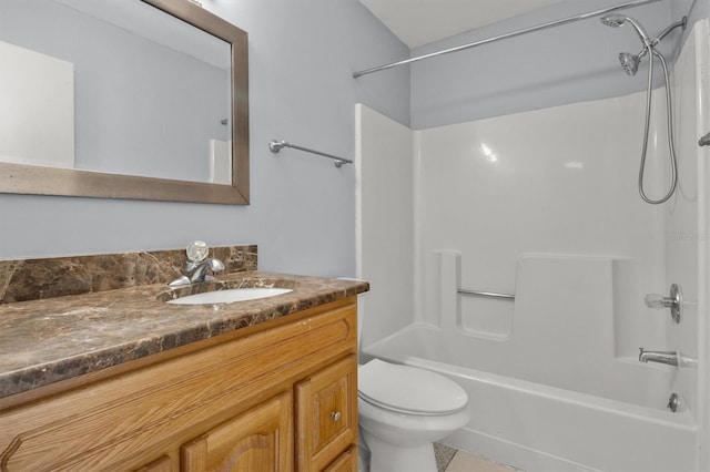 full bathroom featuring tile patterned flooring, vanity, toilet, and  shower combination