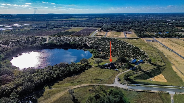 aerial view featuring a rural view and a water view