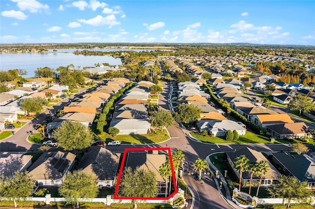 aerial view with a water view and a residential view