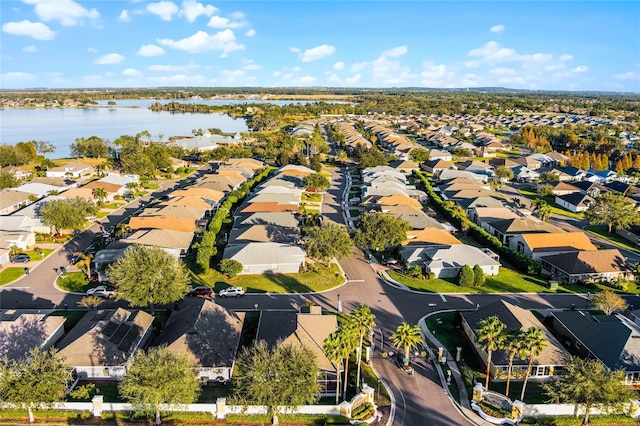 aerial view featuring a water view and a residential view