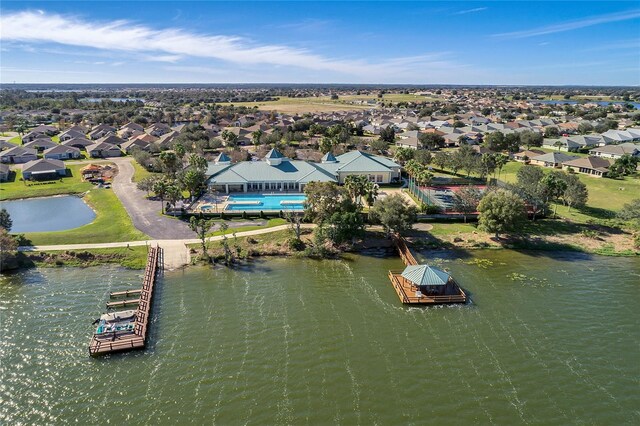 bird's eye view with a residential view and a water view