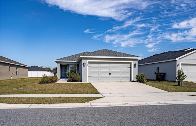 single story home with a garage and a front yard