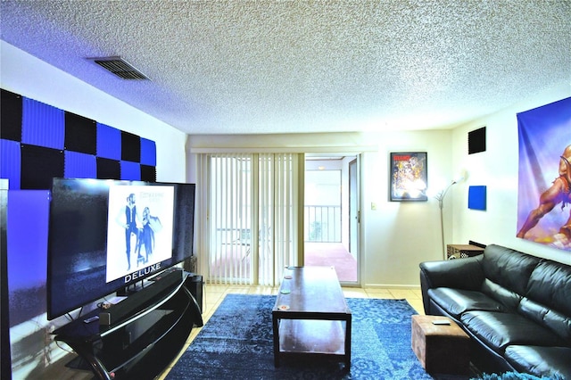 tiled living room with a textured ceiling