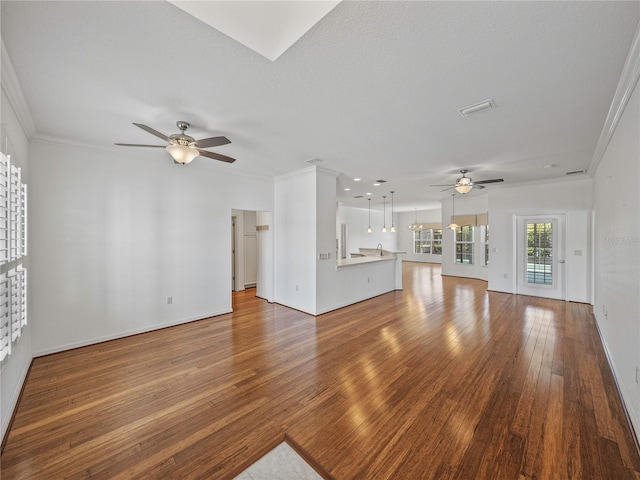 unfurnished living room featuring crown molding, light hardwood / wood-style flooring, and ceiling fan