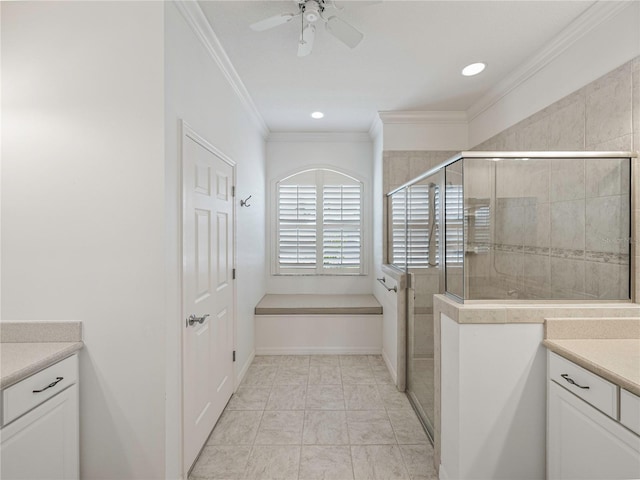 bathroom featuring ceiling fan, crown molding, vanity, and walk in shower