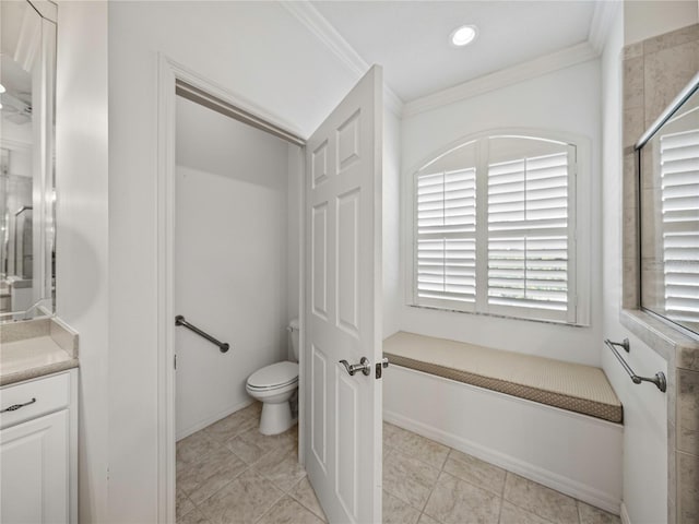 bathroom with tile patterned floors, vanity, toilet, and crown molding