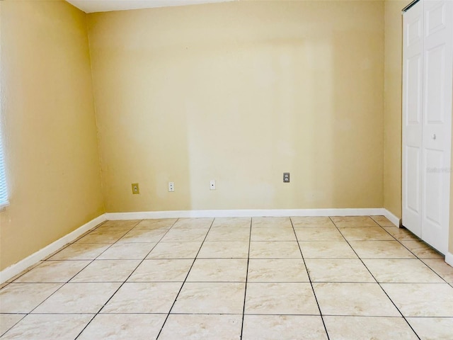 view of tiled spare room