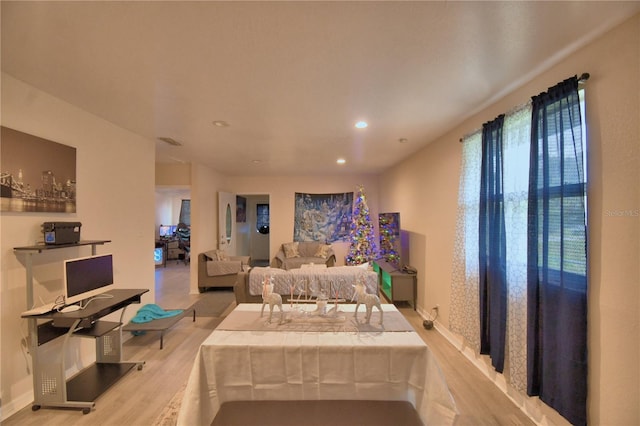 bedroom with light hardwood / wood-style floors