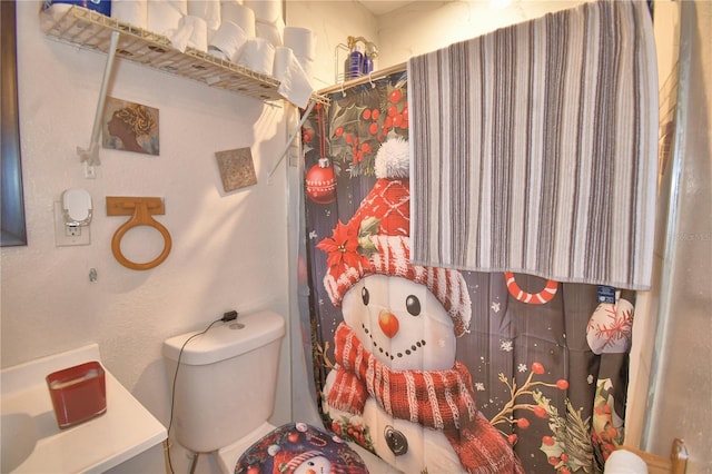 bathroom featuring toilet