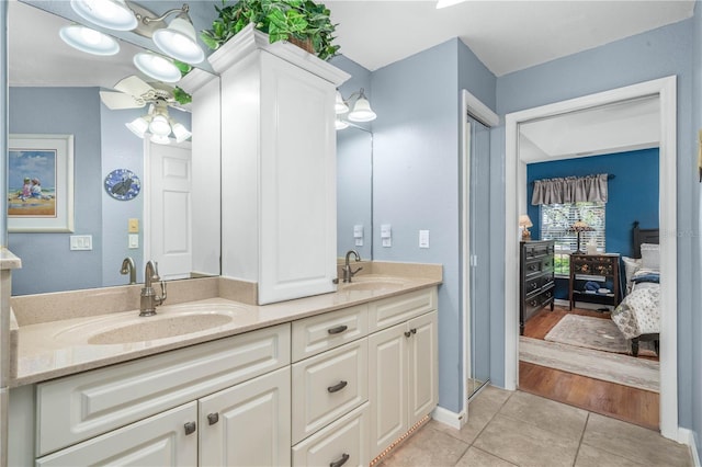 bathroom with wood-type flooring and vanity