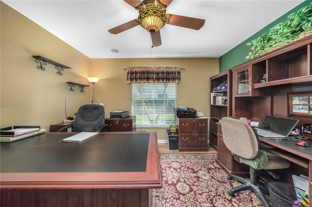 office area with ceiling fan