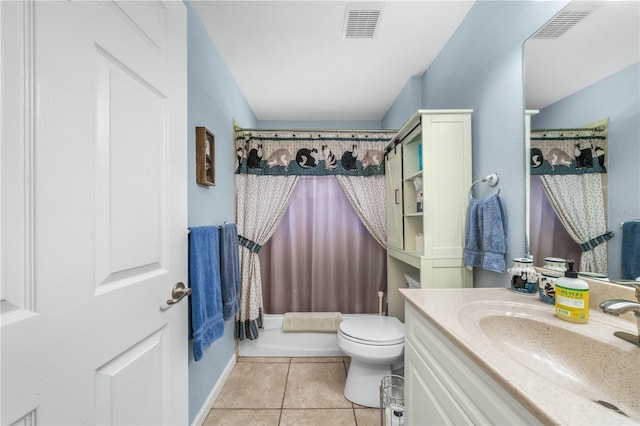 full bathroom featuring tile patterned flooring, vanity, toilet, and shower / bath combo