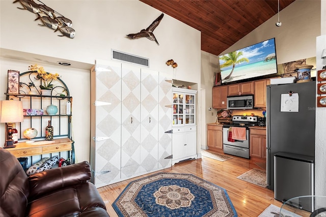 living room featuring light hardwood / wood-style flooring, wood ceiling, and lofted ceiling