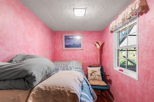 bedroom with a textured ceiling