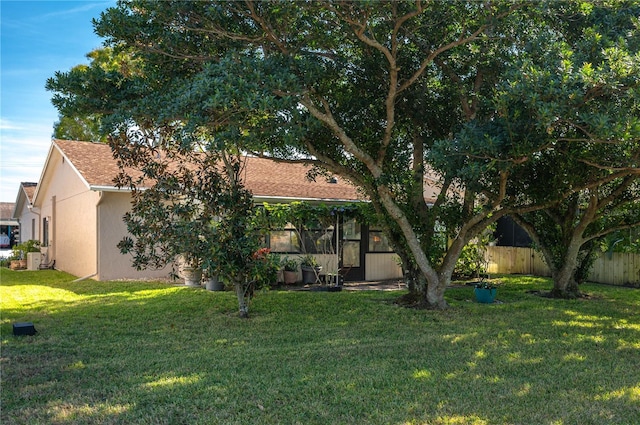 view of front facade with a front lawn